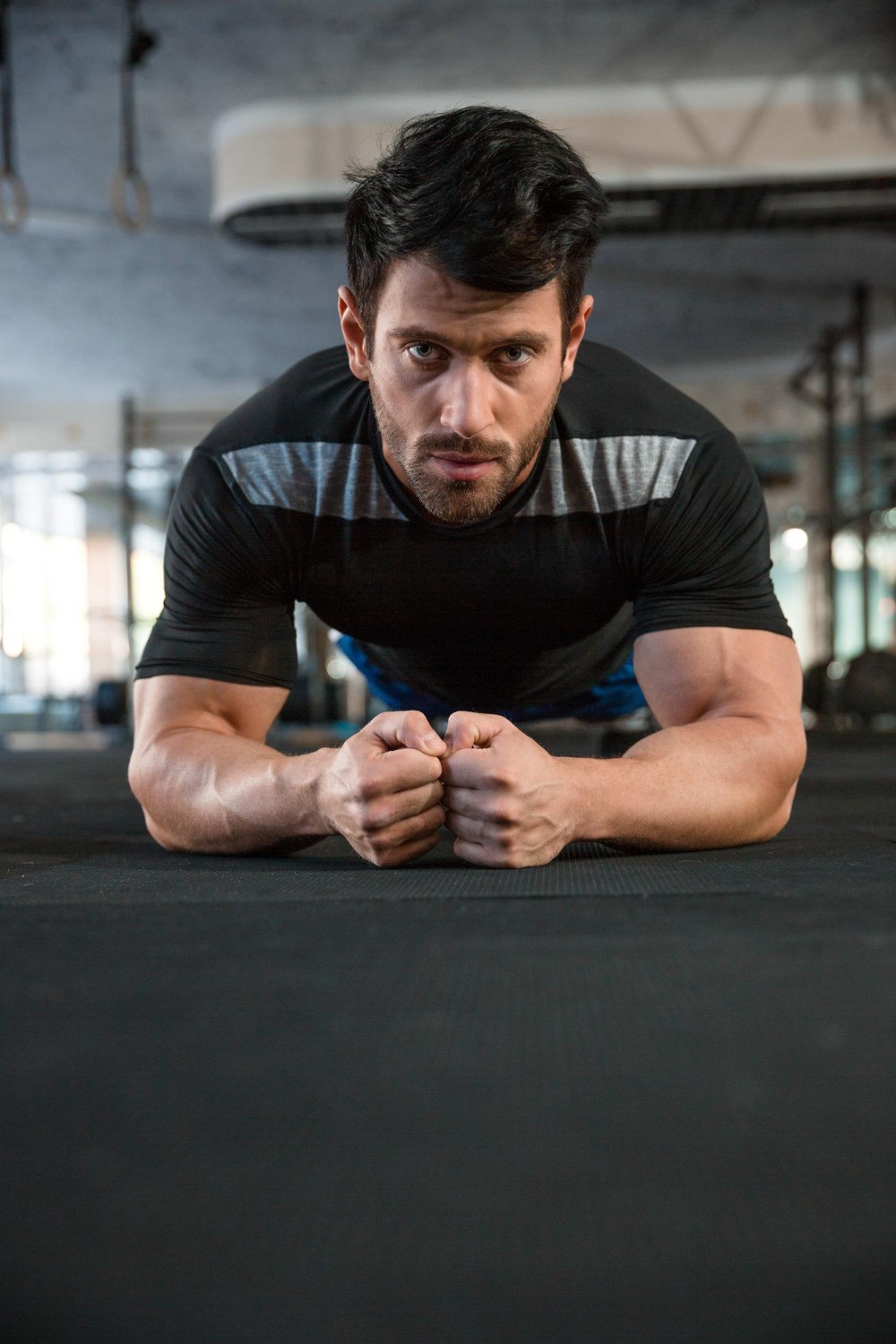 sportsman-wearing-black-t-shirt-training